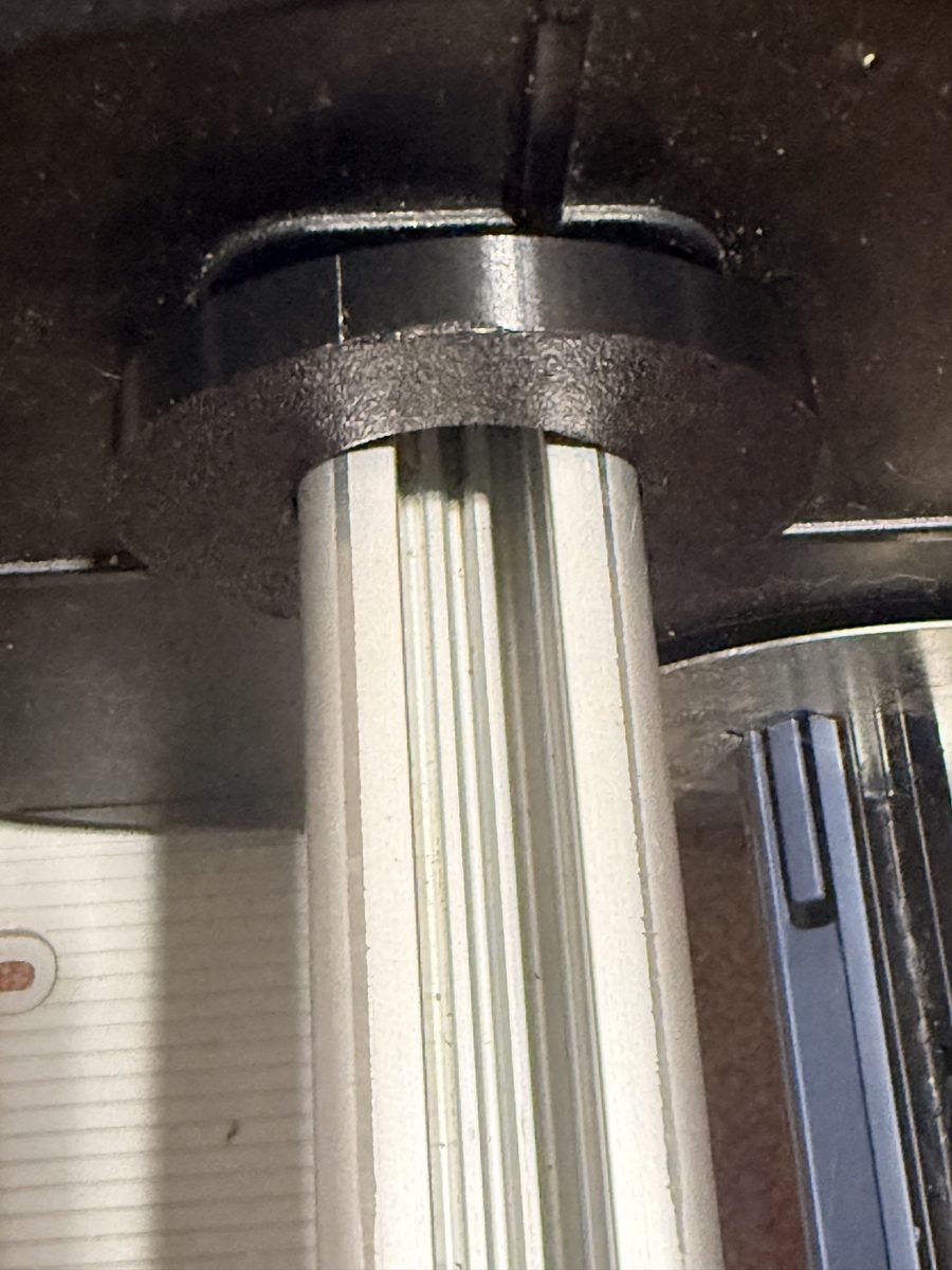 Custom 3D printed locking adjustable collar on shaft, view 1