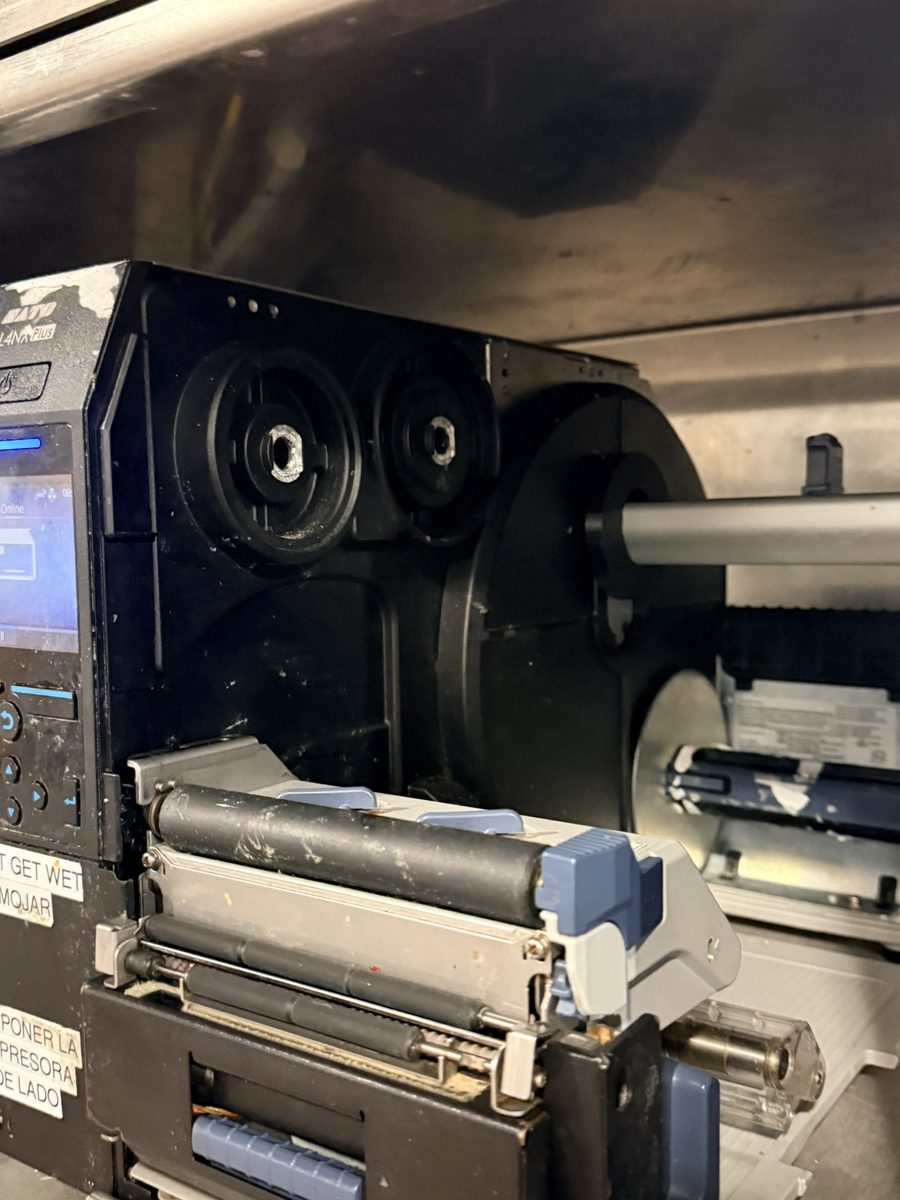 Locking collar installed on Sato CL4NX Plus at the plant, view 3